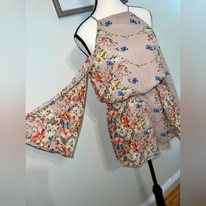 Flowy Floral Print Women's Romper with open shoulders and back